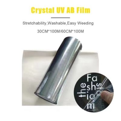 ทองเงิน UV DTF Transfer Film ขาวโปร่ง Ab Pet Film สําหรับกระเป๋าโทรศัพท์มือถือ