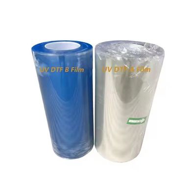 ผิวหนังร้อนเย็น Ab A3 UV DTF Pet Film Roll ใส DTF โอนหนัง 60 ซม.