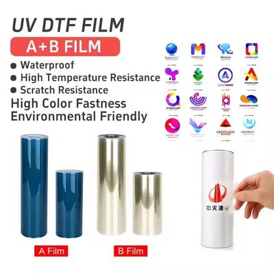UV Dtf Transfer Ab Pet Film Roll Ab Film Transfer Dtf Pet A3 30 ซม UV Dtf ฟิล์มสําหรับเครื่องพิมพ์ UV